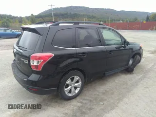 2014 Subaru Forester 2.5i Limited with VIN JF2SJAJC9EH517196, listed as a IAAI auction lot 31343919 with 71,396 mi miles. Bid and sale history available at carsss.com. Image 4.