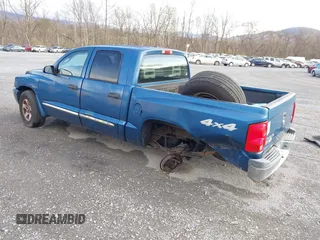 2006 Dodge Dakota Laramie with VIN 1D7HW58N26S524235, listed as a IAAI auction lot 41920951 with 161,689 mi miles and . Bid and sale history available at carsss.com. Image 3.