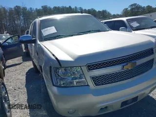 2013 Chevrolet Tahoe LTZ with VIN 1GNSKCE03DR261208, listed as a IAAI auction lot 41853651 with 251,937 mi miles and . Bid and sale history available at DreamBid. Image 1.