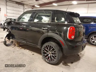 2012 MINI Countryman with VIN WMWZB3C53CWM05133, listed as a IAAI auction lot 41493309 with 114,412 mi miles and . Bid and sale history available at DreamBid. Image 3.