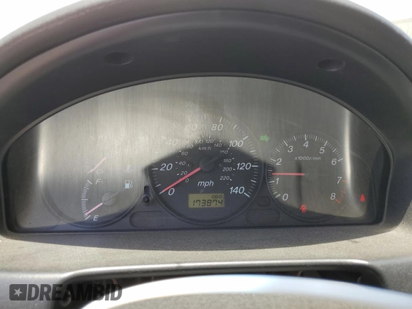 2002 Mazda Protege DX z VIN JM1BJ225920543960, wystawiony jako Copart lot #56336555 z przebiegiem 173 874 mil mil oraz Szkoda całkowita • Salvage title. Historia ofert i sprzedaży dostępna na DreamBid. Obrazek 9.