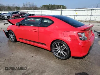 2014 Scion tC with VIN JTKJF5C76E3074921, listed as a Copart auction lot 43088455 with 230,589 mi miles and Salvage Title. Bid and sale history available at carsss.com. Image 2.