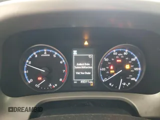 2018 Toyota RAV4 LE with VIN 2T3BFREV2JW724060, listed as a Copart auction lot 49888915 with 49,311 mi miles and Salvage Title. Bid and sale history available at DreamBid. Image 9.
