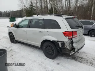 2013 Dodge Journey Crew with VIN 3C4PDCCG4DT698618, listed as a Copart auction lot 87632875 with 198,284 mi miles and Salvage title. Bid and sale history available at DreamBid. Image 2.
