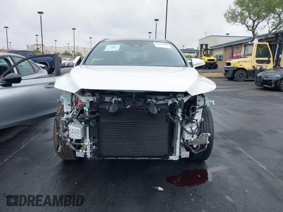 2024 Lexus RX 450h+ Luxury with VIN JTJCJMGA1R2021146, listed as a IAAI auction lot 42204669 with 1,947 mi miles and . Bid and sale history available at DreamBid. Image 13.