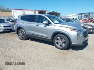 2021 Hyundai Santa Fe SE with VIN 5NMS14AJ7MH320491, listed as a IAAI auction lot 41773594 with 98,440 mi miles. Bid and sale history available at carsss.com. Image 1.