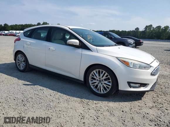 2015 Ford Focus Titanium с VIN 1FADP3N24FL214429, выставлен на аукционе Copart как лот 59159075 с пробегом 157 353 миль миль и Списание • Salvage title. История ставок и продаж доступна на DreamBid. Изображение 4.