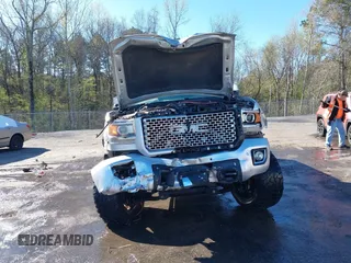2015 GMC Sierra 2500HD available WiFi Denali with VIN 1GT120E87FF173940, listed as a IAAI auction lot 41843586 with 167,992 mi miles. Bid and sale history available at carsss.com. Image 13.