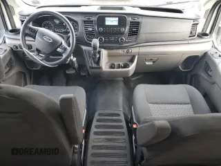 2021 Ford Transit Passenger XL with VIN 1FBAX2C82MKA73592, listed as a Copart auction lot 73312964 with 33,011 mi miles and Salvage Title. Bid and sale history available at carsss.com. Image 8.