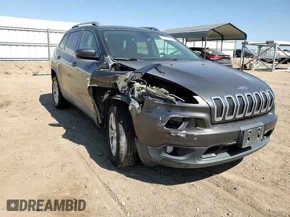 2015 Jeep Cherokee Latitude z VIN 1C4PJMCB2FW734385, wystawiony jako Copart lot #57333805 z przebiegiem 121 249 mil mil oraz Szkoda całkowita • Salvage title. Historia ofert i sprzedaży dostępna na DreamBid. Obrazek 14.