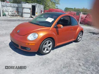 2010 Volkswagen New Beetle Coupe with VIN 3VWRW3AG6AM029534, listed as a IAAI auction lot 41925044 with 163,708 mi miles. Bid and sale history available at carsss.com. Image 2.