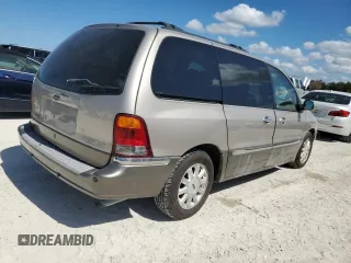2002 Ford Windstar LTD z VIN 2FMDA58472BB82702, wystawiony jako Copart lot #77625364 z przebiegiem Nie podano mil oraz Szkoda całkowita • Salvage title. Historia ofert i sprzedaży dostępna na DreamBid. Obrazek 3.