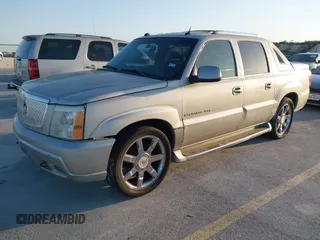 2004 Cadillac Escalade EXT z VIN 3GYEK62NX4G291260, wystawiony jako IAAI lot #41995991 z przebiegiem Nie podano mil oraz . Historia ofert i sprzedaży dostępna na DreamBid. Obrazek 2.