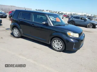 2012 Scion xB with VIN JTLZE4FE5C1147100, listed as a IAAI auction lot 41993922 with 154,620 mi miles. Bid and sale history available at carsss.com. Image 1.