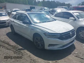 2019 Volkswagen Jetta S z VIN 3VWC57BU9KM103048, wystawiony jako IAAI lot #42178911 z przebiegiem 111 913 mil mil oraz . Historia ofert i sprzedaży dostępna na DreamBid. Obrazek 1.