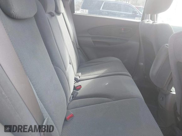 2007 Hyundai Tucson SE with VIN KM8JN12DX7U635740, listed as a IAAI auction lot 41648027 with 169,967 mi miles. Bid and sale history available at carsss.com. Image 8.