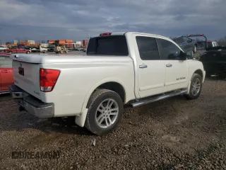 2014 Nissan Titan S with VIN 1N6AA0EC7EN503648, listed as a Copart auction lot 86517824 with 82,556 mi miles and Salvage Title. Bid and sale history available at DreamBid. Image 3.