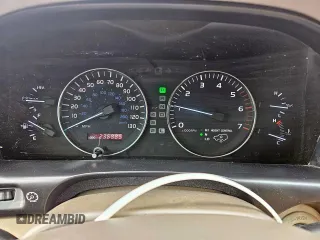 2004 Lexus LX 470 z VIN JTJHT00W743542910, wystawiony jako Copart lot #57187445 z przebiegiem 236 985 mil mil oraz Szkoda całkowita • Salvage title. Historia ofert i sprzedaży dostępna na DreamBid. Obrazek 9.