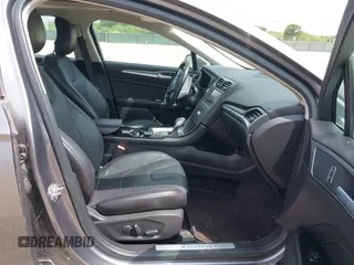 2014 Ford Fusion Titanium with VIN 3FA6P0SU0ER269411, listed as a IAAI auction lot 42163704 with 169,355 mi miles and . Bid and sale history available at DreamBid. Image 5.