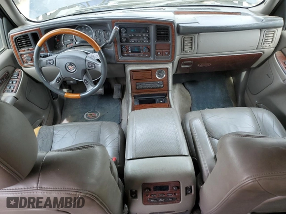 2004 Cadillac Escalade z VIN 1GYEC63T64R260162, wystawiony jako Copart lot #54725685 z przebiegiem 223 615 mil mil oraz Szkoda całkowita • Salvage title. Historia ofert i sprzedaży dostępna na DreamBid. Obrazek 8.