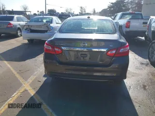 2017 Nissan Altima 2.5 SV with VIN 1N4AL3AP1HC188360, listed as a IAAI auction lot 41432809 with 72,182 mi miles. Bid and sale history available at carsss.com. Image 16.