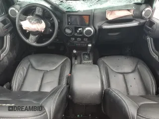 2015 Jeep Wrangler Rubicon with VIN 1C4HJWCG0FL755717, listed as a Copart auction lot 61375435 with 153,207 mi miles and Salvage title. Bid and sale history available at DreamBid. Image 8.