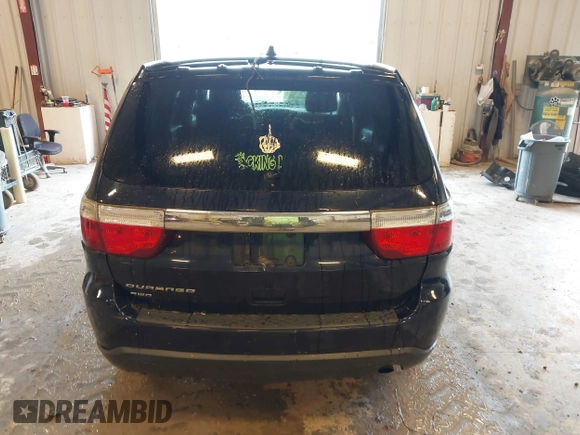 2012 Dodge Durango SXT with VIN 1C4RDJAG9CC169871, listed as a IAAI auction lot 42558583 with 259,113 mi miles and . Bid and sale history available at DreamBid. Image 16.