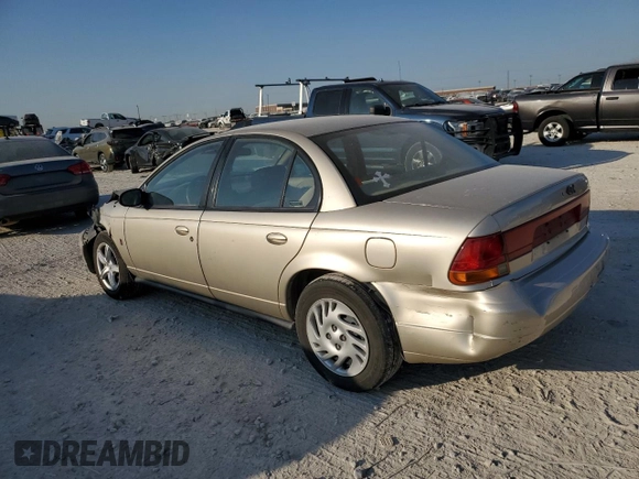 1998 Saturn SL with VIN 1G8ZK5270WZ273902, listed as a Copart auction lot 73430844 with Not provided miles and Salvage title. Bid and sale history available at DreamBid. Image 2.
