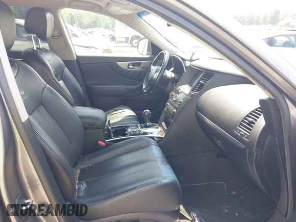 2014 Infiniti QX70 with VIN JN8CS1MW5EM411653, listed as a IAAI auction lot 42690935 with 110,806 mi miles and . Bid and sale history available at DreamBid. Image 5.