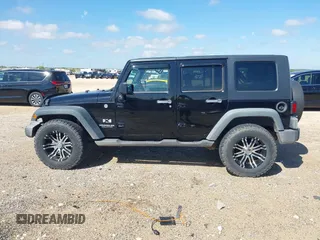 2008 Jeep Wrangler Unlimited X with VIN 1J4GA39148L500904, listed as a IAAI auction lot 42434386 with 195,997 mi miles and . Bid and sale history available at DreamBid. Image 14.