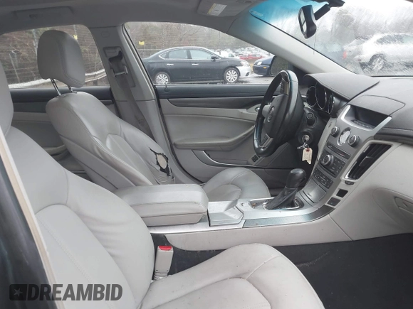 2012 Cadillac CTS with VIN 1G6DA5E56C0143588, listed as a IAAI auction lot 41416131 with 230,310 mi miles and . Bid and sale history available at DreamBid. Image 5.