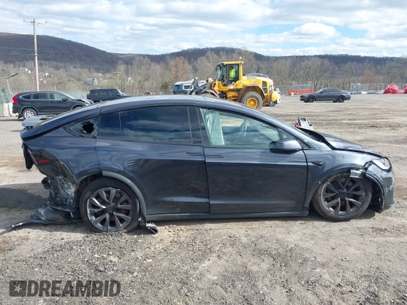 2023 Tesla Model X with VIN 7SAXCDE52PF425834, listed as a IAAI auction lot 41996298 with Not Provided miles and . Bid and sale history available at DreamBid. Image 12.