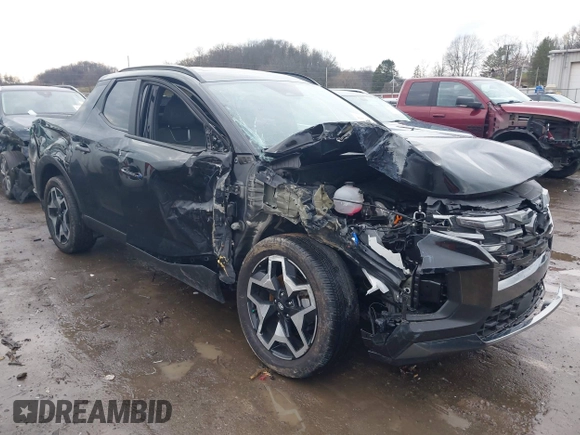 2022 Hyundai Santa Cruz Limited z VIN 5NTJEDAF6NH027151, wystawiony jako IAAI lot #41075036 z przebiegiem 8 611 mil mil oraz . Historia ofert i sprzedaży dostępna na DreamBid. Obrazek 1.