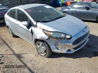 2016 Ford Fiesta S z VIN 3FADP4AJ2GM138776, wystawiony jako IAAI lot #41879870 z przebiegiem 83 769 mil mil oraz . Historia ofert i sprzedaży dostępna na DreamBid. Obrazek 1.