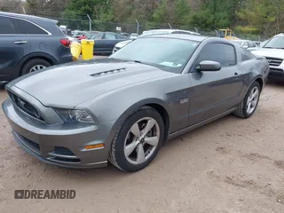 2013 Ford Mustang GT with VIN 1ZVBP8CF1D5261761, listed as a IAAI auction lot 42173607 with 76,658 mi miles and . Bid and sale history available at DreamBid. Image 2.