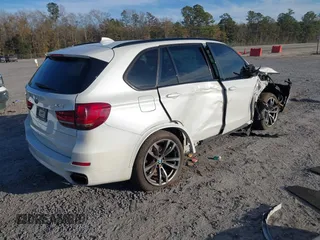 2015 BMW X5 xDrive50i z VIN 5UXKR6C58F0J78013, wystawiony jako IAAI lot #41335257 z przebiegiem Nie podano mil oraz . Historia ofert i sprzedaży dostępna na DreamBid. Obrazek 4.