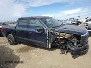 2022 Ford F-150 Lightning Pro z VIN 1FTVW1EL9NWG10318, wystawiony jako Copart lot #47857805 z przebiegiem 33 470 mil mil oraz Szkoda całkowita • Salvage title. Historia ofert i sprzedaży dostępna na DreamBid. Obrazek 4.