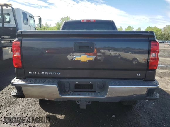 2015 Chevrolet Silverado 1500 LT with VIN 1GCVKREH4FZ197651, listed as a Copart auction lot 55634725 with Not Provided miles and Salvage Title. Bid and sale history available at DreamBid. Image 6.