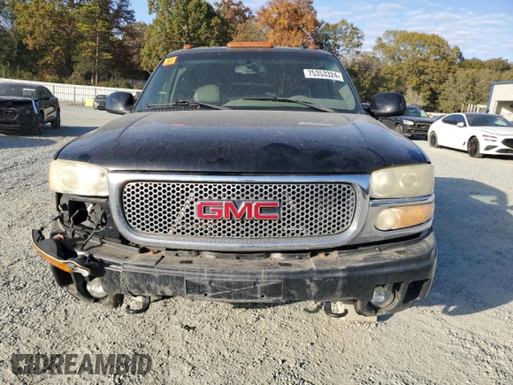 2003 GMC Sierra Denali z VIN 2GTFK69U031261036, wystawiony jako Copart lot #75353324 z przebiegiem 192 762 mil mil oraz Szkody całkowita. Historia ofert i sprzedaży dostępna na DreamBid. Obrazek 5.