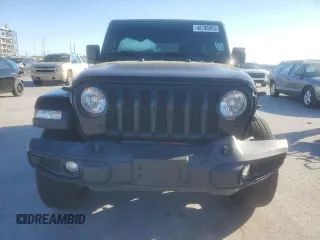 2021 Jeep Wrangler Unlimited Sahara Altitude with VIN 1C4HJXEN3MW659058, listed as a Copart auction lot 48786955 with 88,618 mi miles and Salvage title. Bid and sale history available at DreamBid. Image 5.