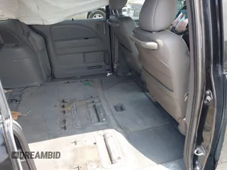 2010 Honda Odyssey Touring с VIN 5FNRL3H90AB070720, выставлен на аукционе IAAI как лот 42335181 с пробегом 145 205 миль миль и . История ставок и продаж доступна на DreamBid. Изображение 8.