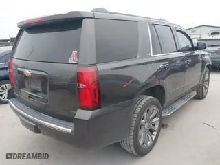 2015 Chevrolet Tahoe LTZ with VIN 1GNSCCKC6FR262769, listed as a IAAI auction lot 41389535 with 196,767 mi miles. Bid and sale history available at carsss.com. Image 4.