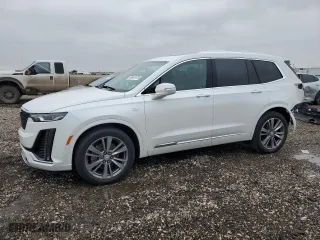 2020 Cadillac XT6 FWD Premium Luxury with VIN 1GYKPCRS0LZ173389, listed as a Copart auction lot 45647475 with 52,933 mi miles and Salvage Title. Bid and sale history available at carsss.com. Image 1.