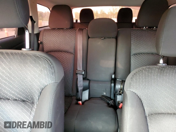 2015 Dodge Journey American Value with VIN 3C4PDCABXFT720583, listed as a Copart auction lot 52882515 with 173,575 mi miles and Salvage Title. Bid and sale history available at DreamBid. Image 10.