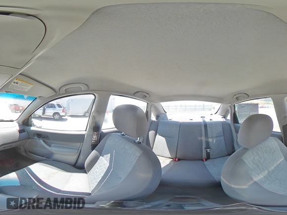 2005 Ford Focus S with VIN 1FAFP34N05W296550, listed as a Copart auction lot 59391835 with 216,509 mi miles and Salvage title. Bid and sale history available at DreamBid. Image 15.