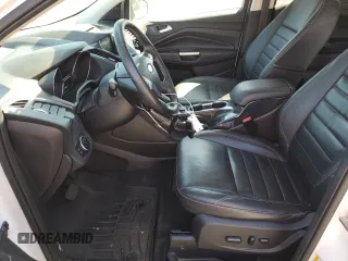 2016 Ford Escape Titanium with VIN 1FMCU9J98GUC00707, listed as a Copart auction lot 54197425 with 95,568 mi miles and Salvage Title. Bid and sale history available at DreamBid. Image 7.