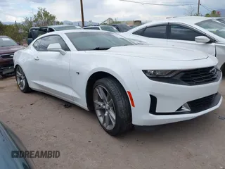 2021 Chevrolet Camaro 1LT with VIN 1G1FB1RS5M0136928, listed as a IAAI auction lot 42638152 with 29,476 mi miles and . Bid and sale history available at DreamBid. Image 1.