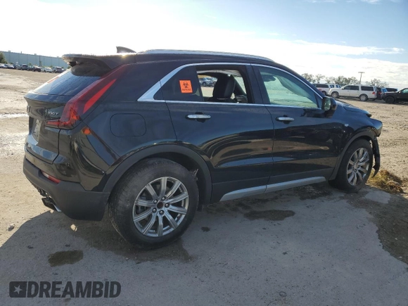 2020 Cadillac XT4 FWD Premium Luxury z VIN 1GYFZCR4XLF070463, wystawiony jako Copart lot #58873345 z przebiegiem 88 406 mil mil oraz Nie do naprawy • Non repairable. Historia ofert i sprzedaży dostępna na DreamBid. Obrazek 3.