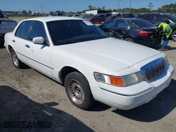 2000 Mercury Grand Marquis LS z VIN 2MEFM75W3YX689323, wystawiony jako IAAI lot #42019687 z przebiegiem 241 045 mil mil oraz . Historia ofert i sprzedaży dostępna na DreamBid. Obrazek 1.