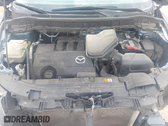 2014 Mazda CX-9 Touring with VIN JM3TB2CA0E0427183, listed as a IAAI auction lot 41734192 with 93,272 mi miles and . Bid and sale history available at carsss.com. Image 10.
